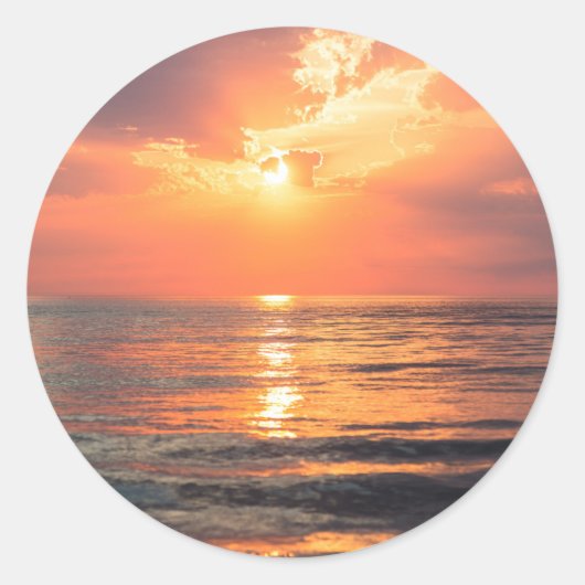 zonsondergang over water ronde sticker (Voorkant)