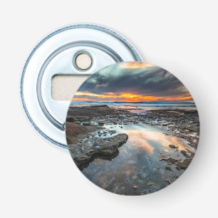 Zonsondergang vanuit de getijdenpoelen button flesopener
