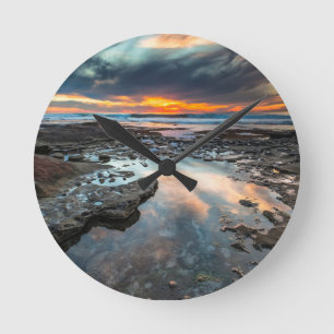 Zonsondergang vanuit de getijdenpoelen ronde klok