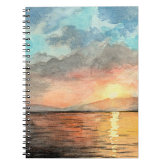 Zonsondergang waterverf schilderij op notitieboek