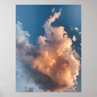 Zonsondergang wolk in een blauwe lucht poster