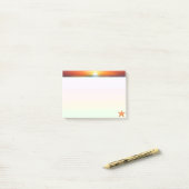 Zonsopgang en zeester in pastelkleuren post-it® notes (Op bureau)