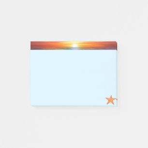Zonsopgang en zeester op lichtblauw post-it® notes