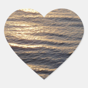 Zonsopgang op kalmerende oceaanwaters Fotografie Hart Sticker