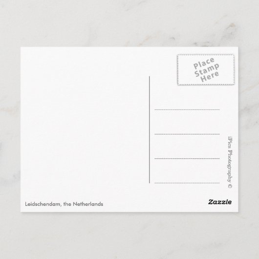 Zonsopkomst over bevroren rivier met windmolens en briefkaart (Achterkant)