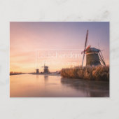 Zonsopkomst over bevroren rivier met windmolens en briefkaart (Voorkant)