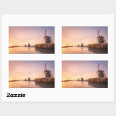 Zonsopkomst over bevroren rivier met windmolens en rechthoekige sticker (Vel)