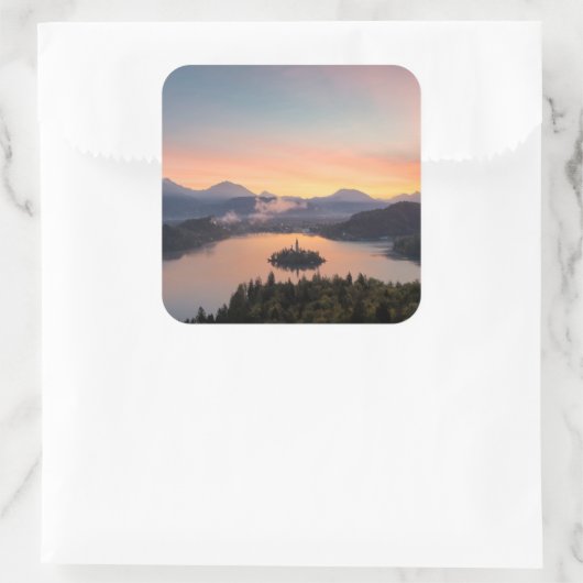 Zonsopkomst over Lake Bled sticker (Tas)