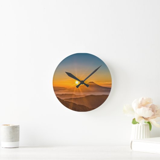 Zonsopkomst tussen de heuvels ronde klok (Huis)