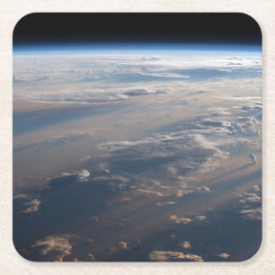 Zonsopkomst werpt lange schaduw over Filipijns Zee Kartonnen Onderzetters