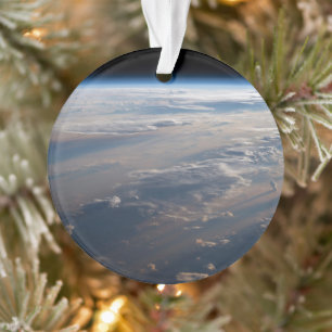 Zonsopkomst werpt lange schaduw over Filipijns Zee Ornament