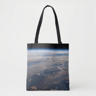 Zonsopkomst werpt lange schaduw over Filipijns Zee Tote Bag