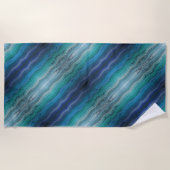 Zoutgolven voor kuststrand op zwart strandlaken (Voorkant)