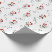 Zure kerstklep met moffelkerstmanshat cadeaupapier (Hoek)