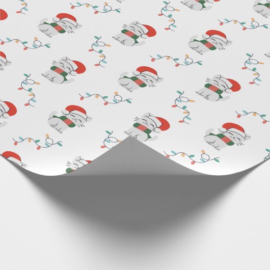 Zure kerstklep met moffelkerstmanshat cadeaupapier (Hoek)