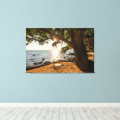 Zwaaien op de strand bij zonsondergang canvas afdruk (Insitu (Houten vloer))