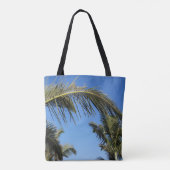Zwaaiende palmboom onder een heldere hemel tote bag (Achterkant)
