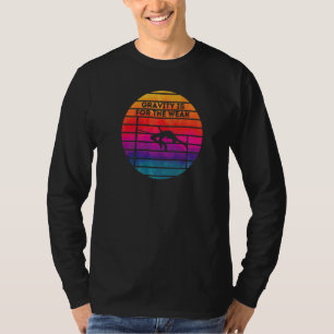 Zwaartekracht is voor de zwakke retro kleuren hoog t-shirt