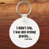 Zwaartekracht werkt sleutelhanger (Voorkant)