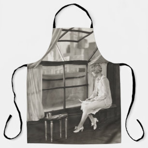 Zware vrouw die uit de raam1940 staart, vrouw, vin schort