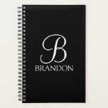 Zwart, aangepast script monogram en naam planner<br><div class="desc">De gepersonaliseerde eigenschappen van het Monogram en van de Gift van de Naam personaliseerde monogram in de witte klassieke stijl van de manuscriptdoopvont en naam in de witte klassieke stijl van de serif doopvont op zwarte achtergrond. Perfect als vakantiecadeau,  vaderdag cadeau voor vader en cadeau voor speciale gelegenheden.</div>
