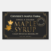 Zwart apeletiket met etiket op spuit met lek en da (Voorkant)