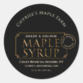 Zwart apeletiket met etiket op spuit met lek en da (Voorkant)