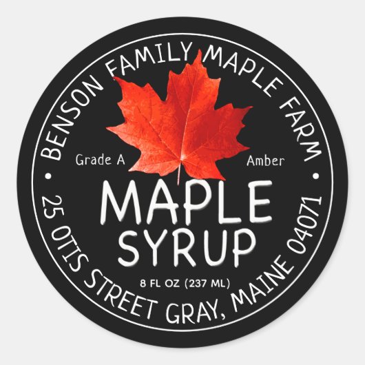 Zwart apeletiket met rode suikermantel ronde sticker (Voorkant)