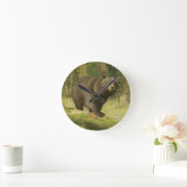 Zwart Beer dat op een boomstam steekt Ronde Klok (Huis)