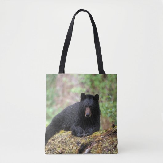 Zwart beer op een oud groeilogboek tote bag (Voorkant)
