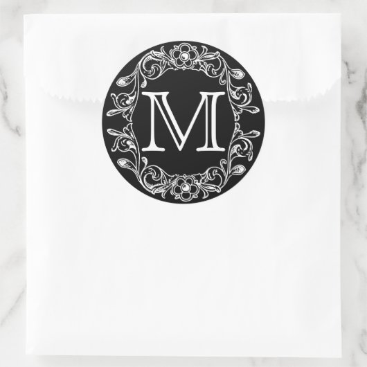 Zwart bloemmonogram ronde sticker (Tas)