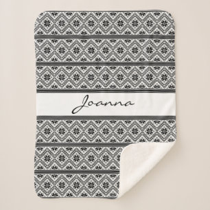 Zwart borduurwerk sherpa deken