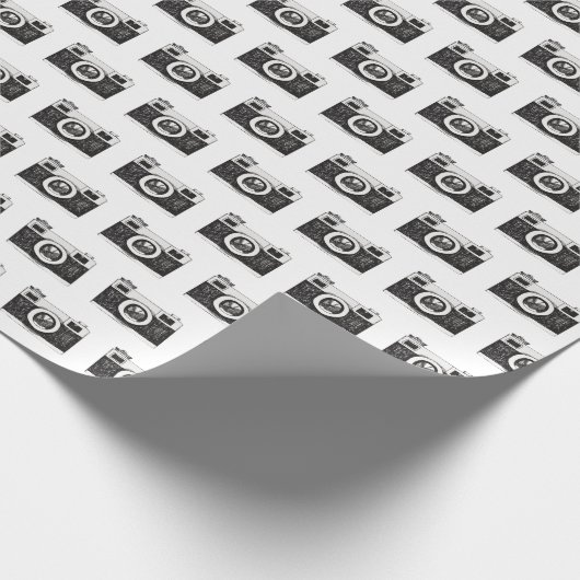 Zwart camera grafisch op wit cadeaupapier (Hoek)