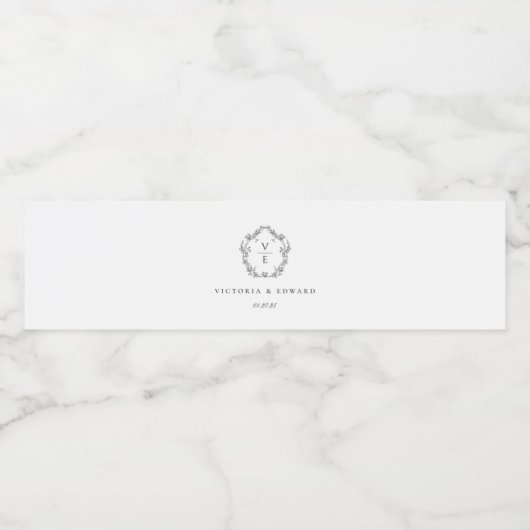 zwart crest monogram bruiloft waterfles etiket (Enkel label)