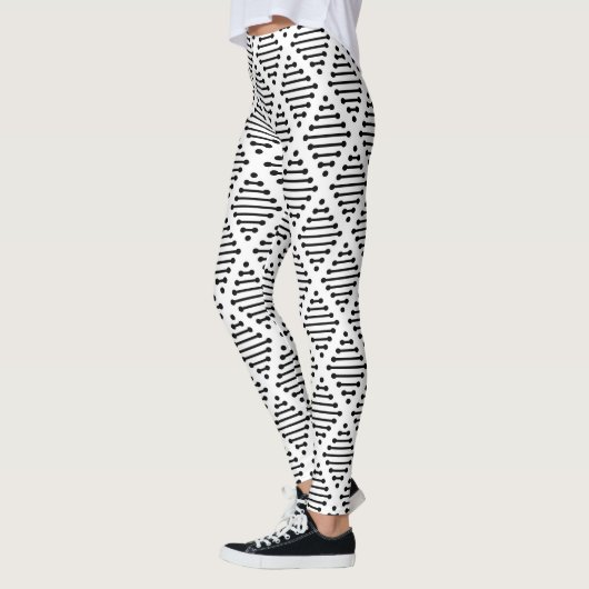 Zwart en beige leggings (Links)