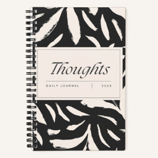 Zwart en beige spiraaljournaal notitieboek