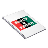 Zwart en gekleurd op een rode, zwarte en groene kl notitieboek (Rechterzijde)