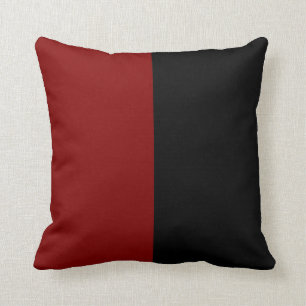 Zwart en gespleten kleur met lepel. kussen
