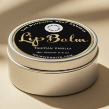 Zwart en goud folie lippenbalsem label met logo.
