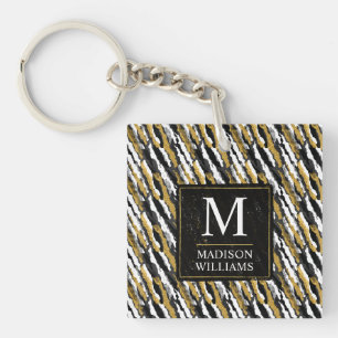 Zwart en goud glinsterend wit dier zebra patroon sleutelhanger