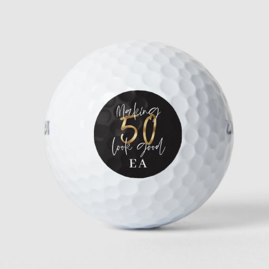 Zwart en goud plezier 50e verjaardag golfballen (Voorkant)