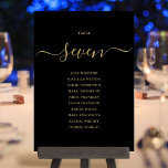 Zwart en goud Script Table Number Zittingkaart Kaart<br><div class="desc">Deze elegante zwart en gouden handtekeningenscript dubbelzijdige tafelnummer zitplaatskaarten zijn perfect voor alle feesten. Ontworpen door Thisnotme©</div>