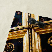 Zwart en goud strandlaken (In situ)