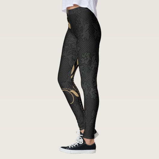Zwart en gouddecoratief patroon leggings (Links)
