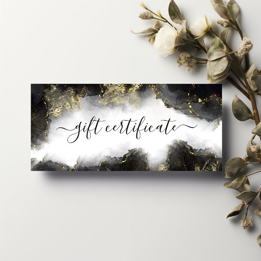 Zwart en goudmatig vloeibaar inktpapier