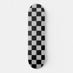 Zwart en grijs geplakt persoonlijk skateboard