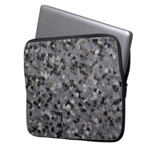 Zwart en grijs mozaïek met gedeeltelijk verwijderd laptop sleeve