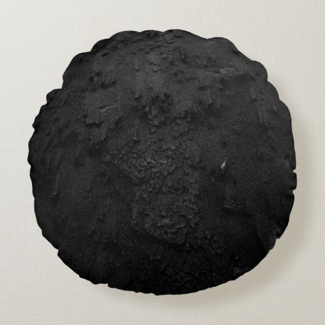 Zwart en grijs steenfragment rond kussen (Voorkant)