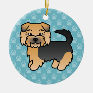Zwart En Lichtbruin Norfolk Terrier-hond Op Blauwe Keramisch Ornament