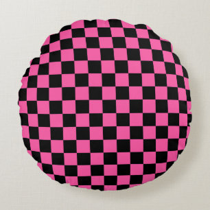 Zwart en roze dambordpatroon rond kussen